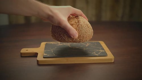 Whole Loaf of Bread Placed on Serving Board