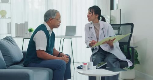 Doctor with old man patient use clipboard for consulting, advice and medical expert in clinic.
