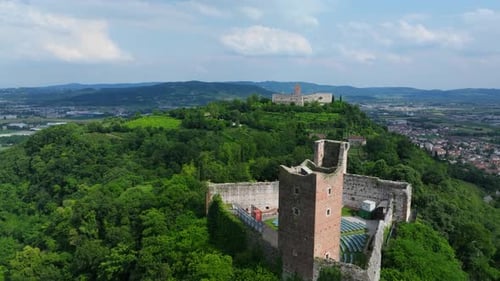 Panoramic Aerial View of Ancient Medieval Castle on Green Hill