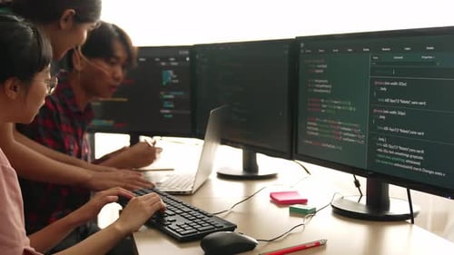 Slow motion back end software developer engineer writing code. Burgeoning