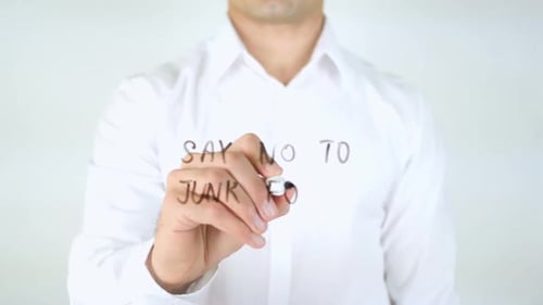 Man Writes 'Say No To Junk Food' On Glass