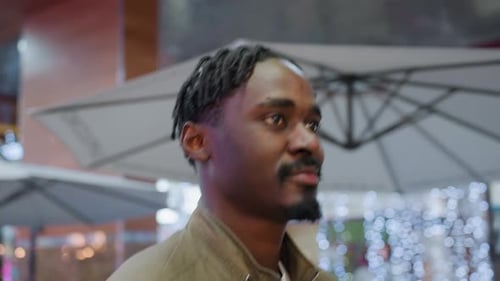 Teen Walking In Cafe With Warm Smile
