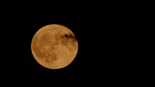 Full Moon with Cloud Passing in the Night Sky