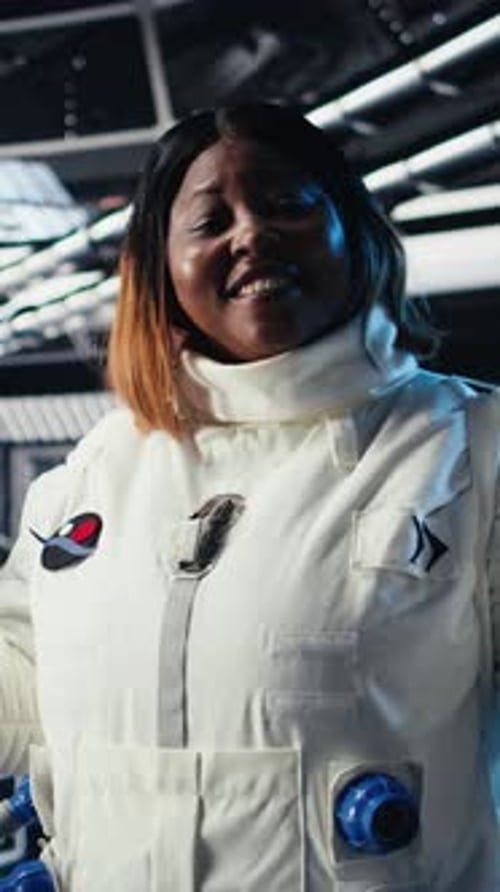 Vertical Video Female Astronaut Performing Routine Maintenance in Starship Travelling to Mars