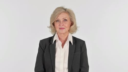 Serious Senior Business Woman on White Background