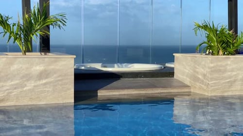 Luxury Rooftop Jacuzzi and Pool Overlooking Blue Ocean