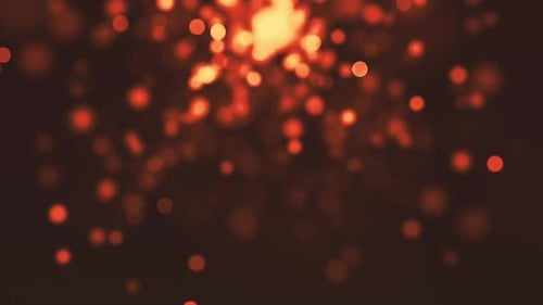 Abstract Glowing Orange Bokeh Particles Background