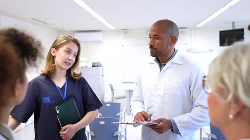 Medical Team Discussing Patient Care in Hospital Conference Room