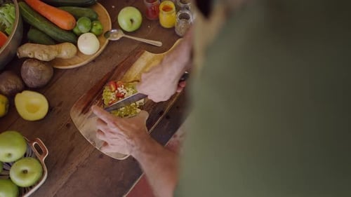 Preparing Sandwich with Fresh Ingredients on Cutting Board
