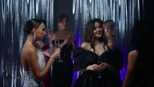 Glamorous Women Celebrating and Toasting at a Party