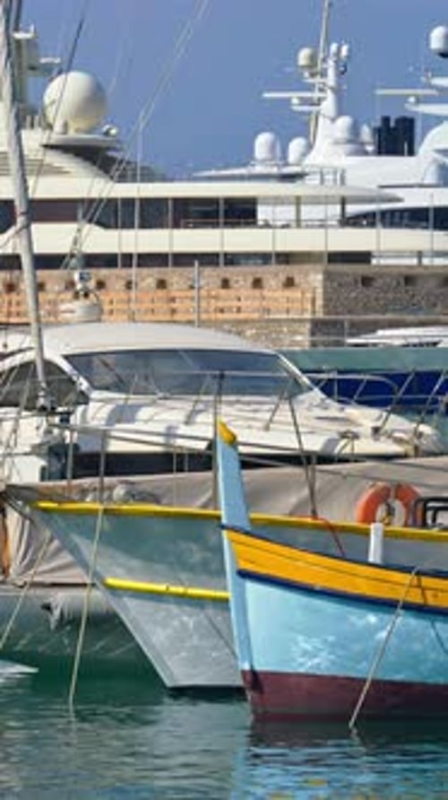 Close up of boats docked in the Port Vauban in Antibes, France. Vertical