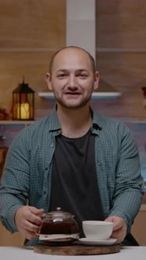 Vertical Video Young Man Talking on Video Call with Family for Festive Season