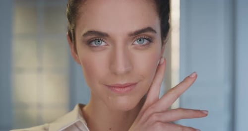 Glamorous Young Woman Smiling and Posing Close Up