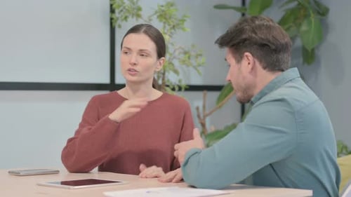 Young Business People Talking in Office