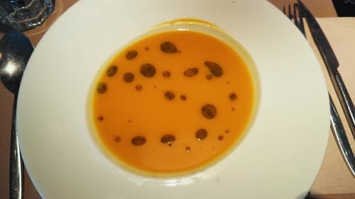 Close Up of Soup Bowl at Restaurant Table