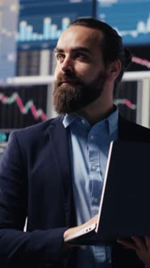 Vertical Video Economy Expert Reviewing Financial Data and KPI Dashboards