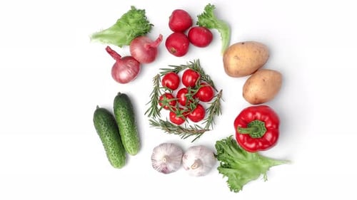 Overhead View of Fresh Vegetables on White