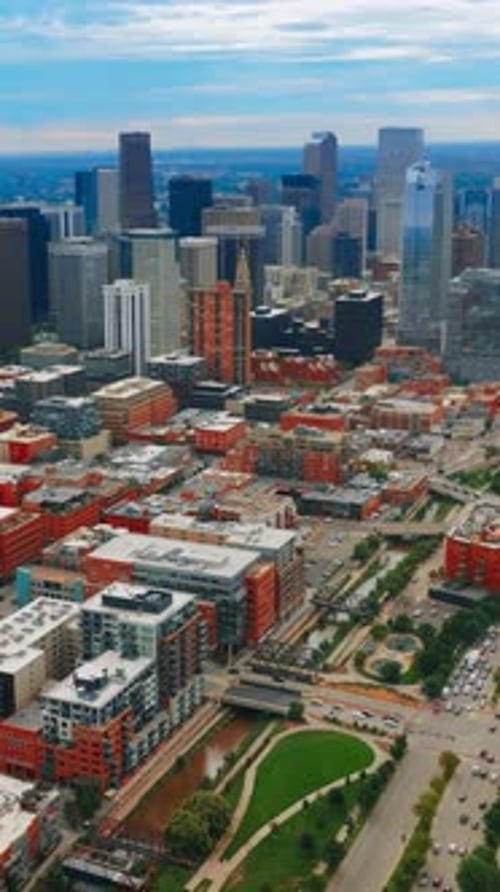 Aerial panorama of Denver, Colorado. Downtown urban cityscape buildings. Vertical video