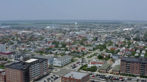 High aerial pull away of a residential community along the Long Island shore