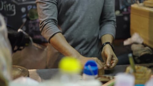 Street Food Vendor Preparing Roti at Night