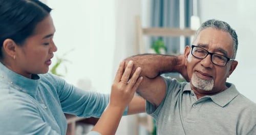 Man Receiving Physical Therapy at Home
