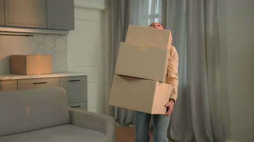 Ethnic African American Woman Carrying Heavy Cardboard Boxes Drop Recieve Parcels on Floor Orders