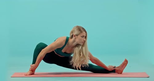 Fitness, woman and yoga stretching in studio for healthy workout, exercise