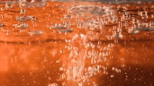 Water Bubbles on Shiny Orange Background