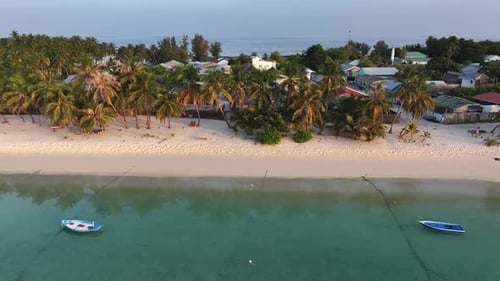 Aerial view of beach and clear ocean water, Maldives.