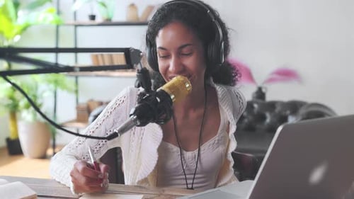 Young Adult Recording Podcast at Home