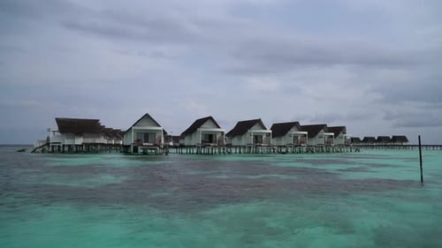 tropical Maldives resort hotel and island with beach and sea