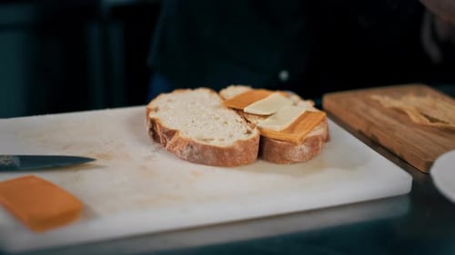 Closeup in Professional Kitchen Chef Folding Cheese Bruschettas Restaurant Serving