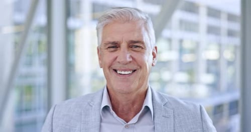 Face, ceo and senior man in office for business in corporate company workplace