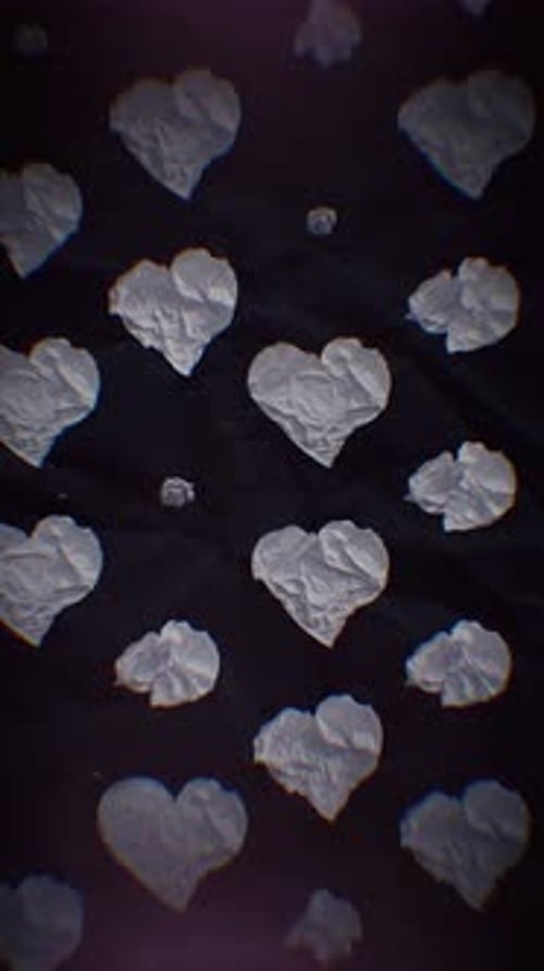Animated Crumpled Paper Hearts Vertical Pattern Reveal