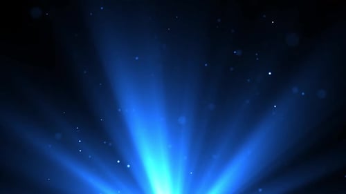 Belles particules bleues scintillantes avec lentille flasée sur fond noir