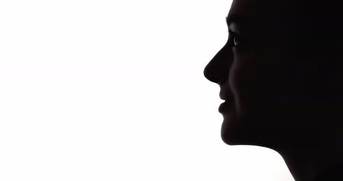 Silhouette of Face Against White Background
