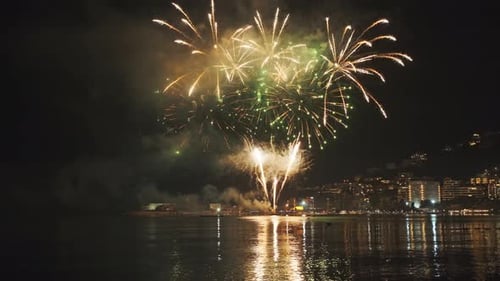 Fireworks with Colorful Lights Over Sea