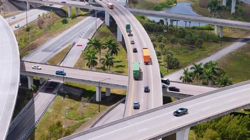 Highway Intersection Area in Miami City with the Fastmoving Vehicles Showing US Transportation