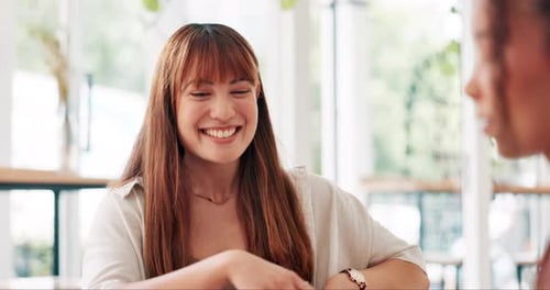 Friends, woman and talking at coffee shop with happy conversation, social life and funny chat