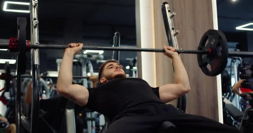 Bench Press Hardcore Gym Barbell Exercise Weightlifting Area Gym is Relatively Quiet with