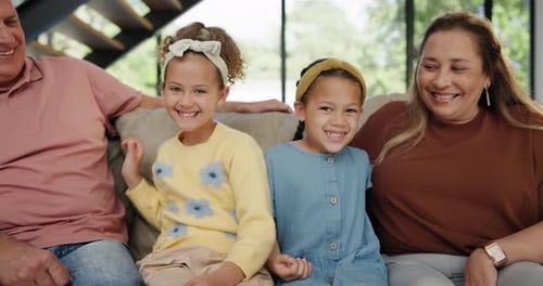 Grandparents, children and happy in lounge, hugging and excited for family picture on couch