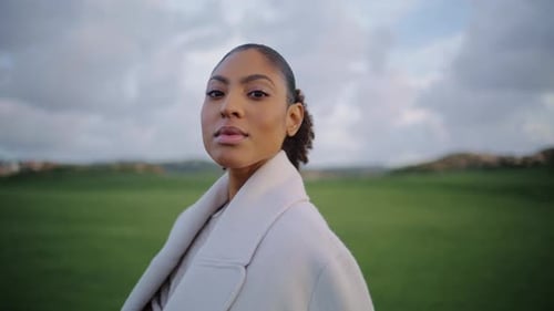 Pensive Woman in Meadow Serenity