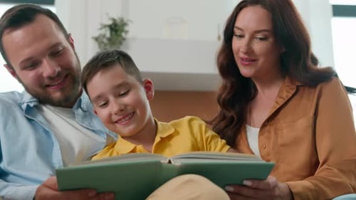 Mother Father Son Reading Book Together in Cozy Living Room Loving Parents Read Fairy Tale Boy Child