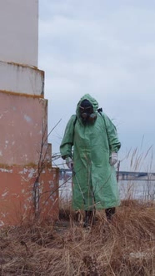 Postapocalyptic Concept a Man in a Gas Mask Wearing Protective
