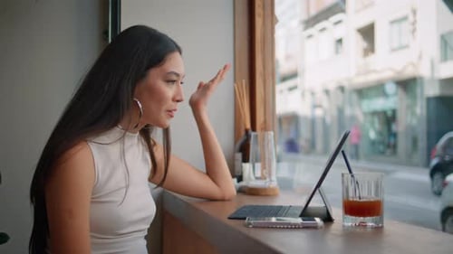 Asian Woman Video Calling Laptop in Cafe Close Up Smiling Girl Talking Camera