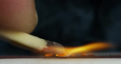 Macro shot of a match that is access. Concept: passion, power, sportiness, engines, aggression and