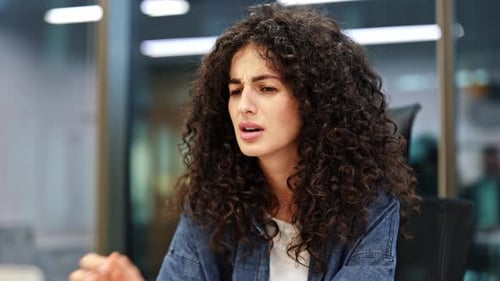 Woman Having a Sore Throat in Office