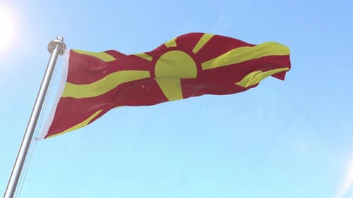 North Macedonia Flag Waving in Blue Sky