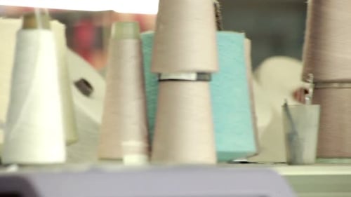 Colorful Spools of Thread at Textile Factory/Yarn Reels/Cotton Thread Spools at Cloth