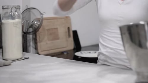 woman making bread in the kitchen at home stock video